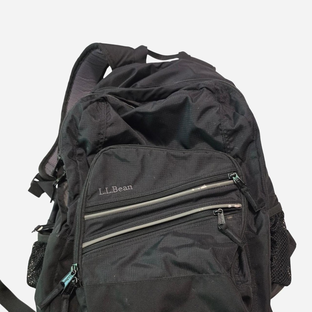 Black L.L.Bean backpack with multiple pockets and mesh sidepockets